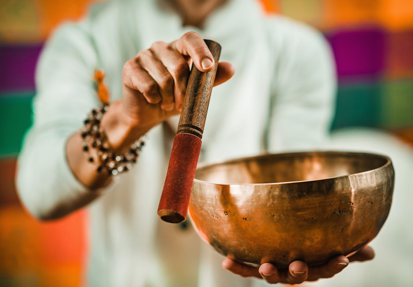 Man holding singing bowl