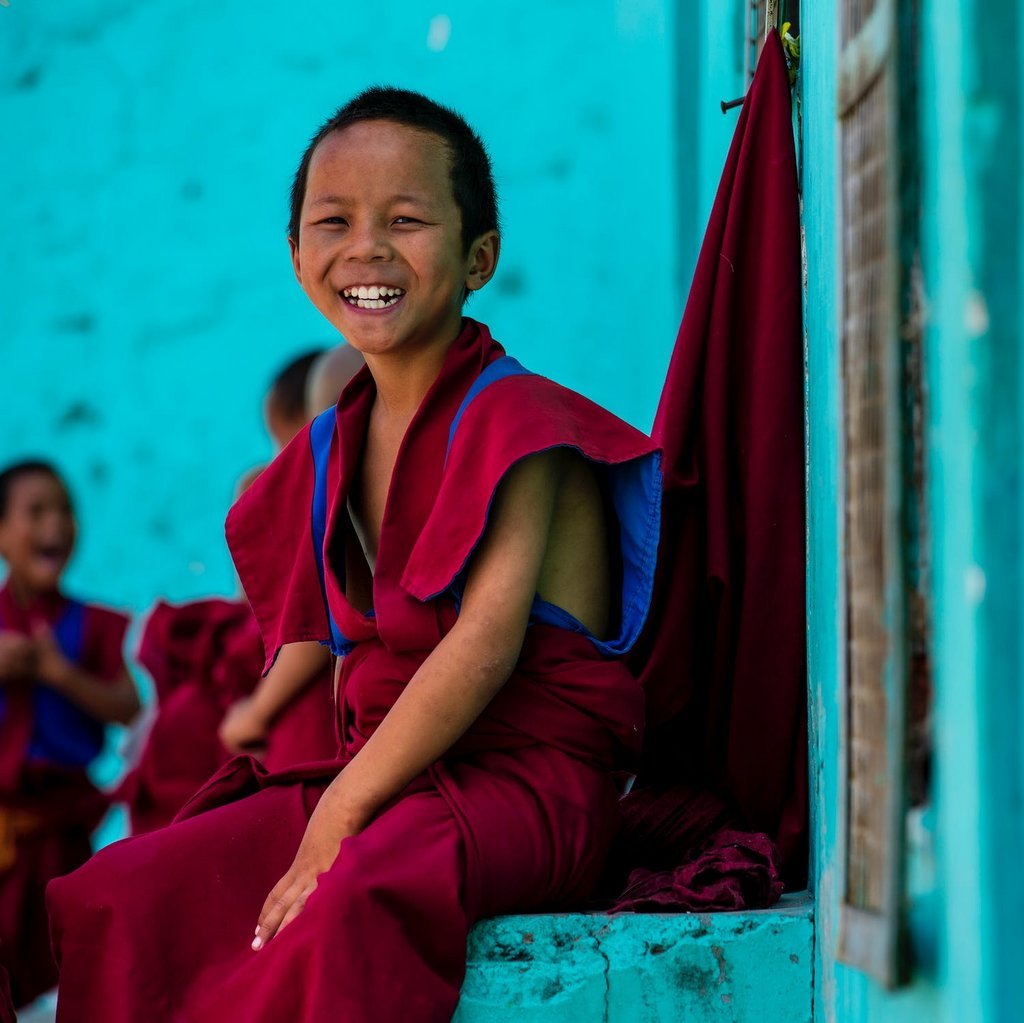 Child in Red Monk Robe